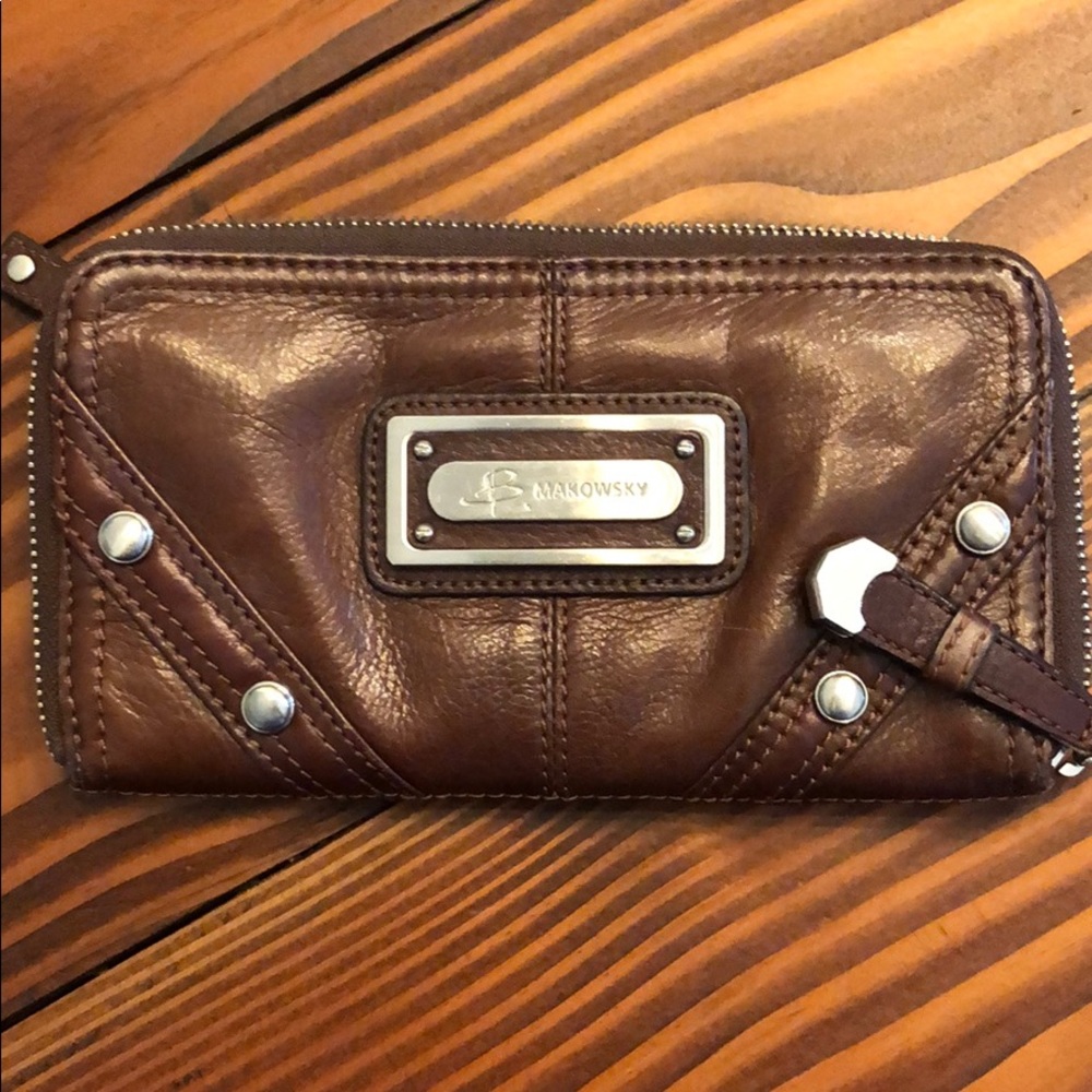 Brown leather zipper wallet. Good used condition.